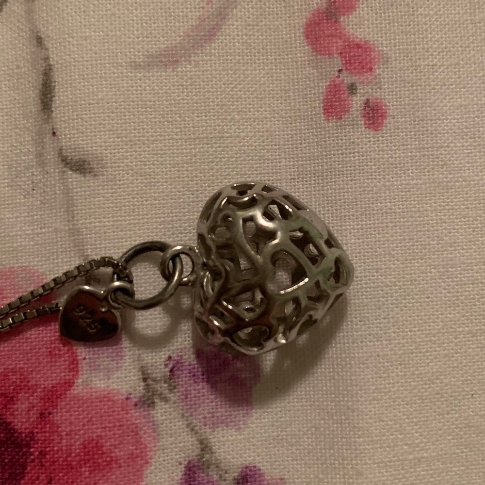Sterling silver heart cage necklace